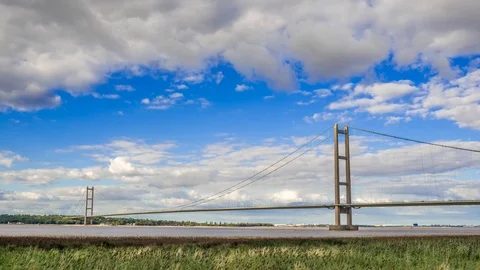 Humber Bridge Timelapse with blue sky and puffy clouds Stock Footage