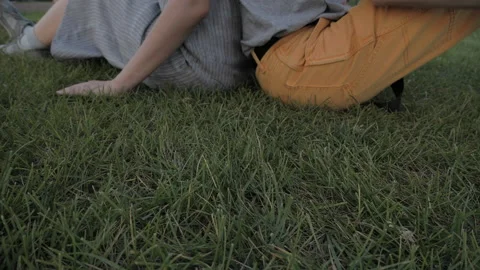 The humble touch of the hands of a young guy and a girl Stock Footage 135734806