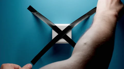 Humen Blocks Internet Socket With An Insulating Tape On The Blue Wall Stock Footage 146678058