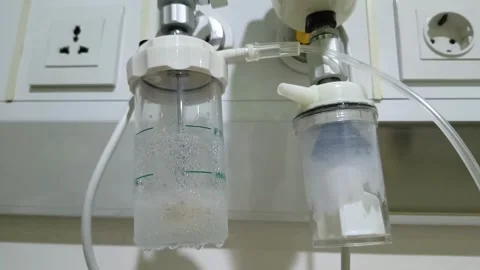Humidifier and oxygen flow meter in a hospital providing health Stock Footage 303867390