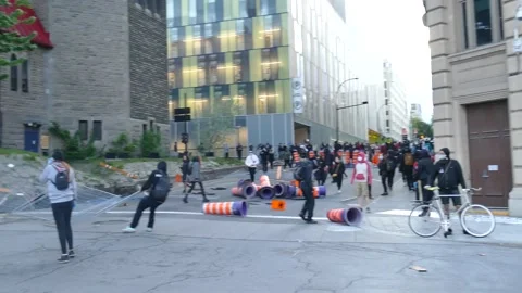 Humiliating fall for anti-fa trying to bring a fence Stock Footage 132376975