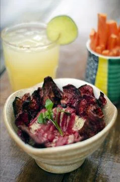 Hummus with beetroot chips tapas snack set Stock Photos