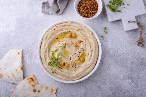 Hummus from chickpeas and pita bread. Stock Photos