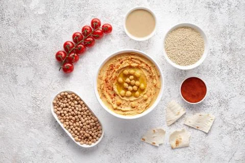 Hummus flat lay with ingridients, healthy diet natural vegetarian snack protein Stock Photos