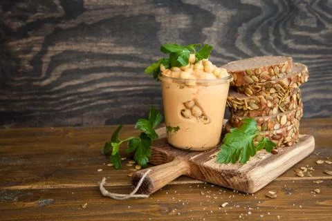 Hummus with fresh bread Stock Photos