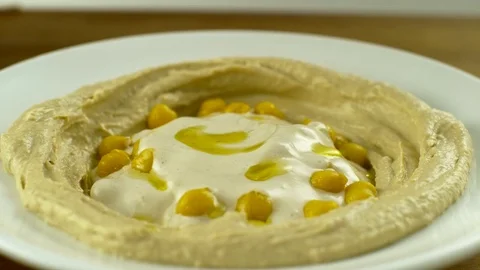 Hummus with Parsley SlowMotion4 Stock Footage 84059434