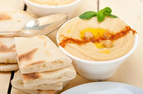 Hummus with pita bread Stock Photos