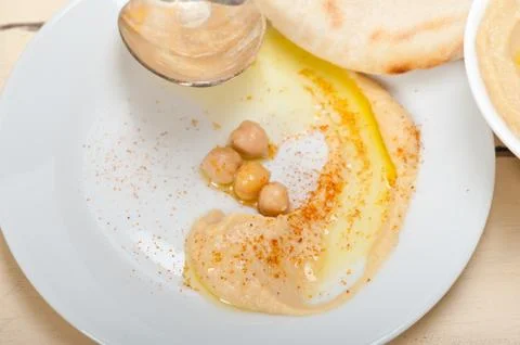 Hummus with pita bread Stock Photos