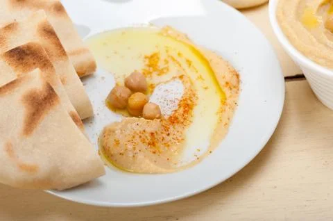 Hummus with pita bread Stock Photos