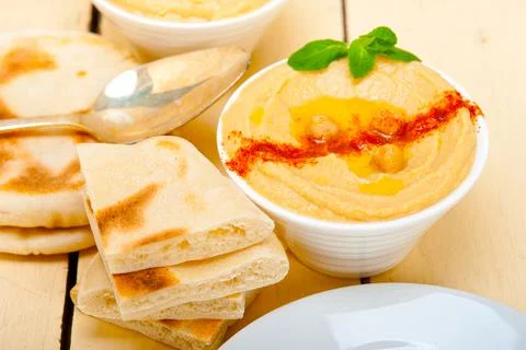 Hummus with pita bread Stock Photos