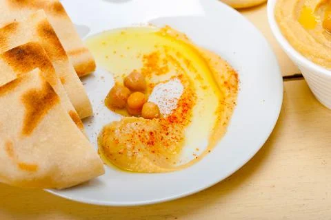 Hummus with pita bread Stock Photos
