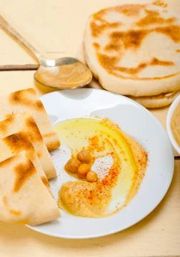 Hummus with pita bread Stock Photos