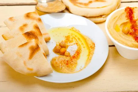 Hummus with pita bread Stock Photos