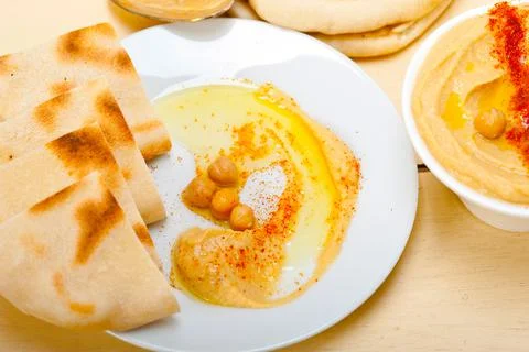 Hummus with pita bread Stock Photos