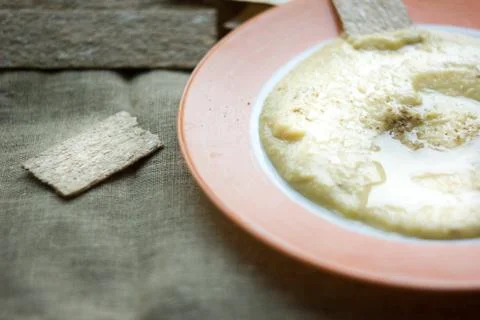 Hummus in plate. Stock Photos