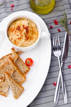 HUMMUS SERVING PLATE Stock Photos