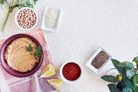 Hummus spread, made from cooked and smashed chickpeas, tahini, olive oil, garlic Stock Photos