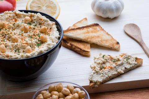 Hummus with toast Stock Photos