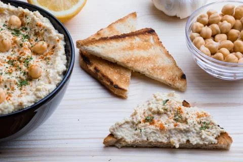 Hummus with toast Stock Photos