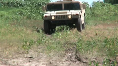Hummvee driving 1PR Stock Footage 11303928