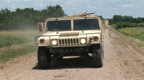 Hummvee driving 7PR Stock Footage 11319511