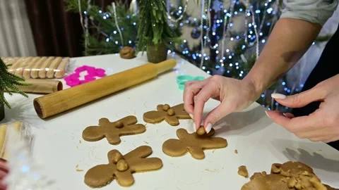 Humor in the kitchen with gingerbread men and balloon fun Stock Footage 344819648