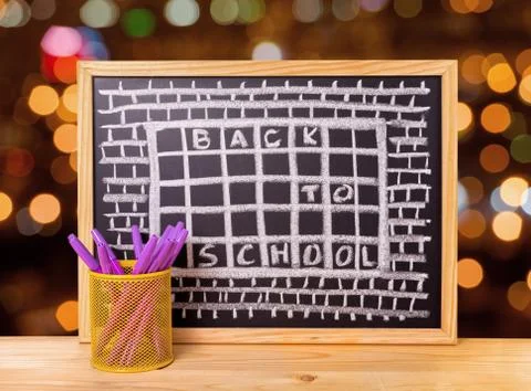Humorous concept of hate school as prison with text back to school is written Stock Photos
