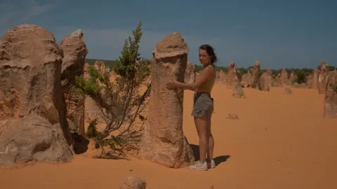Humorous Encounter with Phallic Rock Formation Stock Footage 315992996