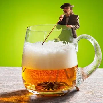 Humorous image with drinker and two beers Stock Photos