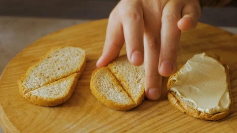 Humus on toast Stock Footage 109600926