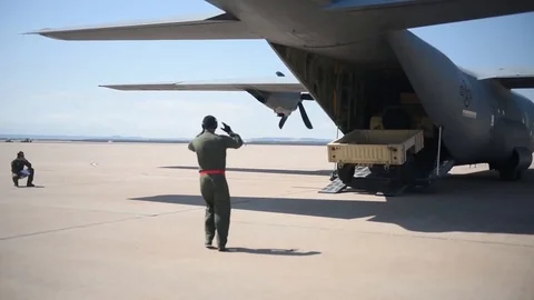 Humvee is being unload from Lockheed Mar... | Stock Video | Pond5