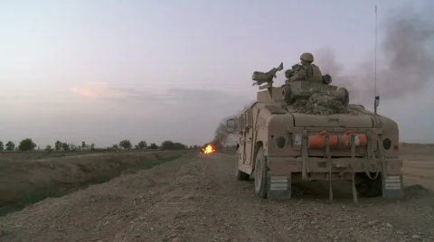 Humvee on fire after hitting bomb (HD) m Stock Footage