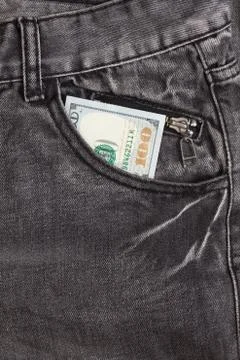 Hundred dollar bill inside front pocket jeans Stock Photos