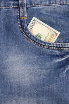 Hundred dollar bill inside front pocket jeans Stock Photos