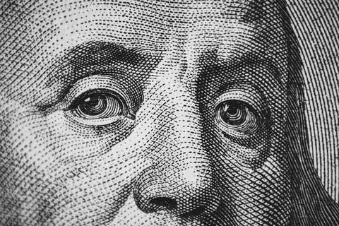 Hundred dollar bill macro texture, Franklin eyes closeup Stock Photos