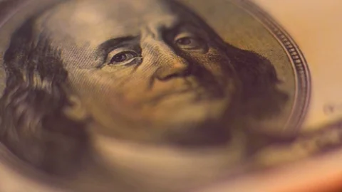 A hundred-dollar bill with a portrait of Benjamin Franklin is on fire Stock Footage 85262288