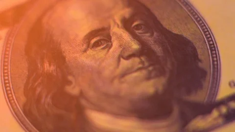 A hundred-dollar bill with a portrait of Benjamin Franklin is on fire Stock-Footage 85262722