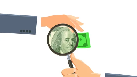 Hundred dollar bill through a magnifying glass Stock-Footage 86971345