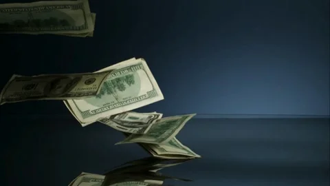 Hundred dollar bills fall on blue surface Stock Footage 327123371