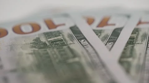 Hundred-dollar bills fall on the table. counting cash. macro. payment, deal. Stock Footage 264600703