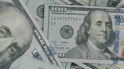 Hundred Dollar Bills Falling Onto A Pile Of Money Stock Footage 324840779