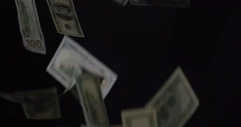 Hundred Dollar Bills raining down in slow motion Video stock 64937649