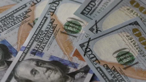 Hundred dollar bills spinning on a table. Stock Footage 175309164