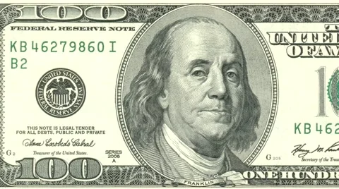 Hundred dollar note obverse dolly shot from left to right showing 100 symbols Stock Footage 61556135