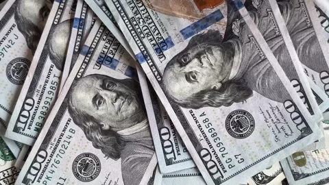 Hundred Dollars bill falling down on a pile of money. Stock Footage 282345803