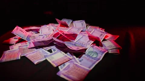 Hundred Rupee Notes Added to Scattered Cash Stock Footage 313670479