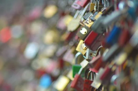 Hundreds of colourful padlocks. Stock Photos