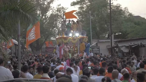 Hundreds of devotees join the Ram Rath procession which started from Stock Footage 213444639