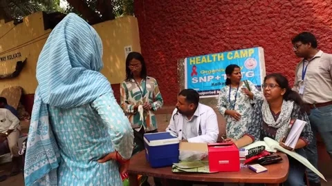Hundreds gather for free HIV testing in India's Kolkata, INDIA, IN - 17 Mar 2025 Stock Footage 304342385