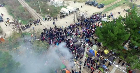 Hundreds of immigrants are in a wait at the border between Greece and FYROM Stock Footage 57356872